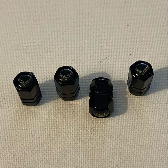 Corvette Valve Stem Caps in Black with Logo NWT - Picture 1 of 4